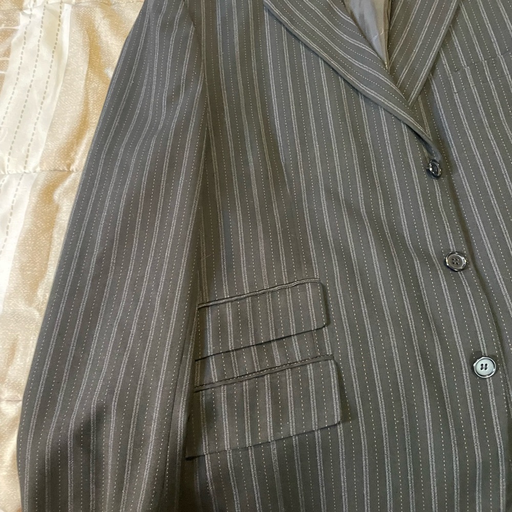 Elegant black Pinstripe Suit with gray and orange stripes